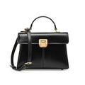 Black genuine leather women's shoulder bag with a vachette clasp, shown open to reveal a zippered hidden pocket.
