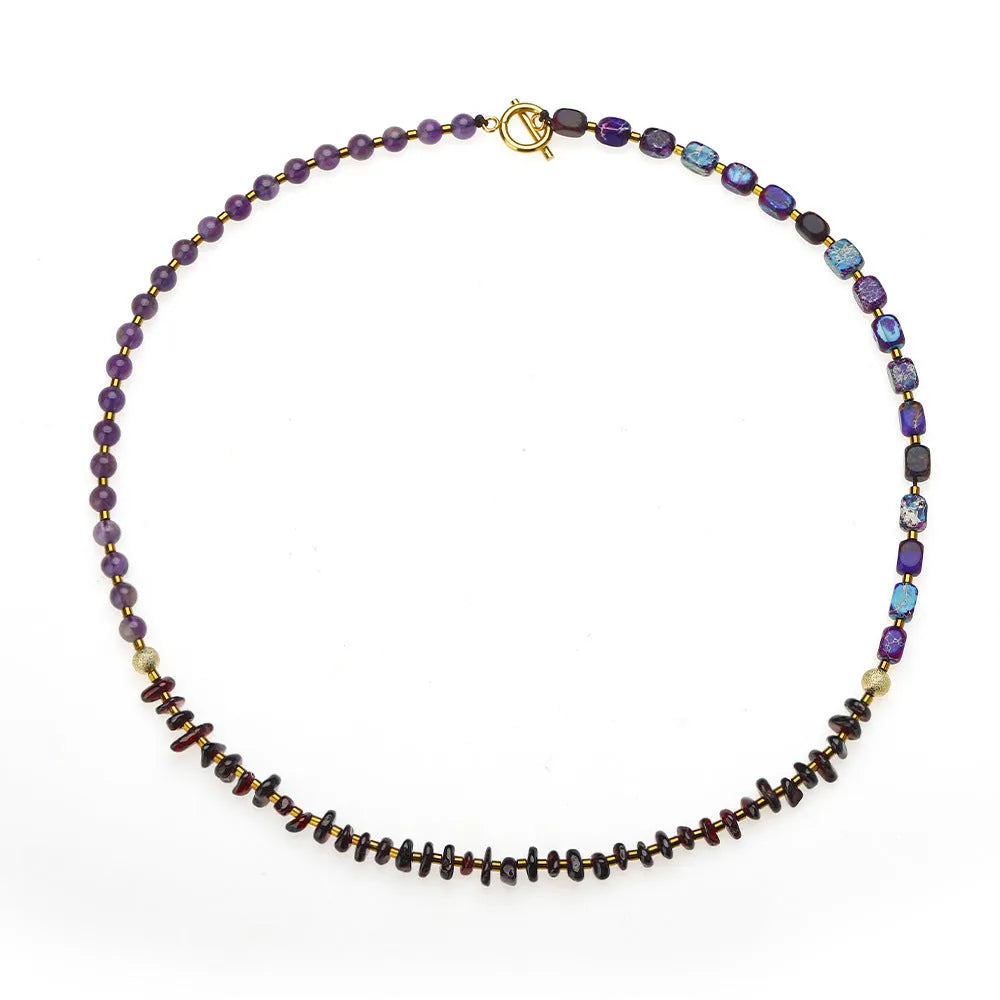 Handcrafted purple amethyst and garnet stone bracelet with geometric bead arrangement