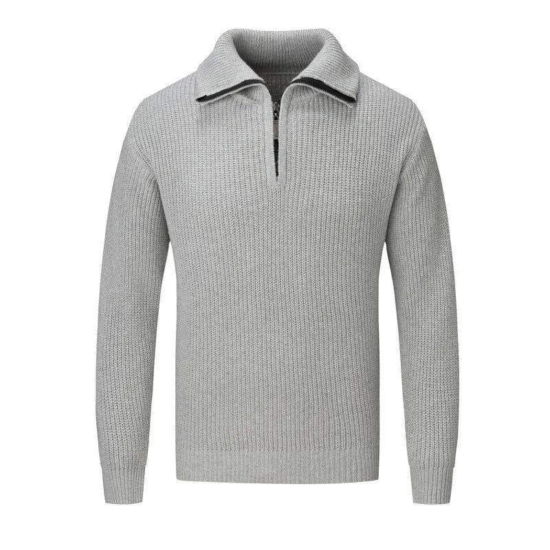 Man wearing a solid-colour slim-fit pullover sweater in a casual setting.