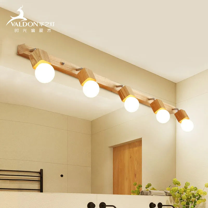 Compact one-head LED wall lamp with a 24cm diameter on a white wall.