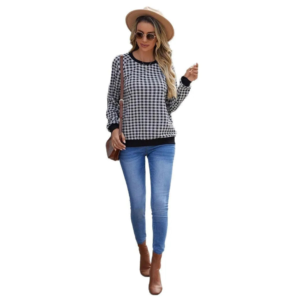 Black polyester pullover sweater with printed plaid and stripe pattern, long sleeves