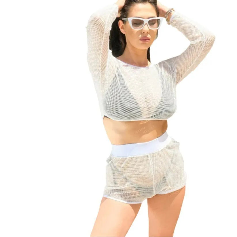 White transparent women's two-piece swimsuit set with a top and skirt for the beach.