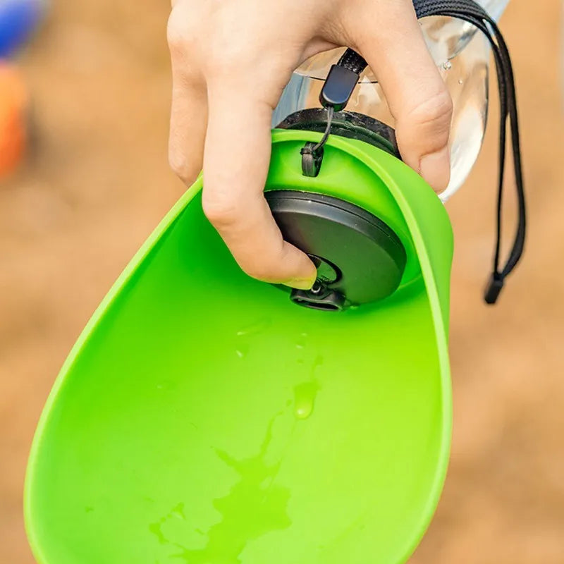 Blue pet water bottle with attached drinking bowl showing 680ml capacity and hanging clip
