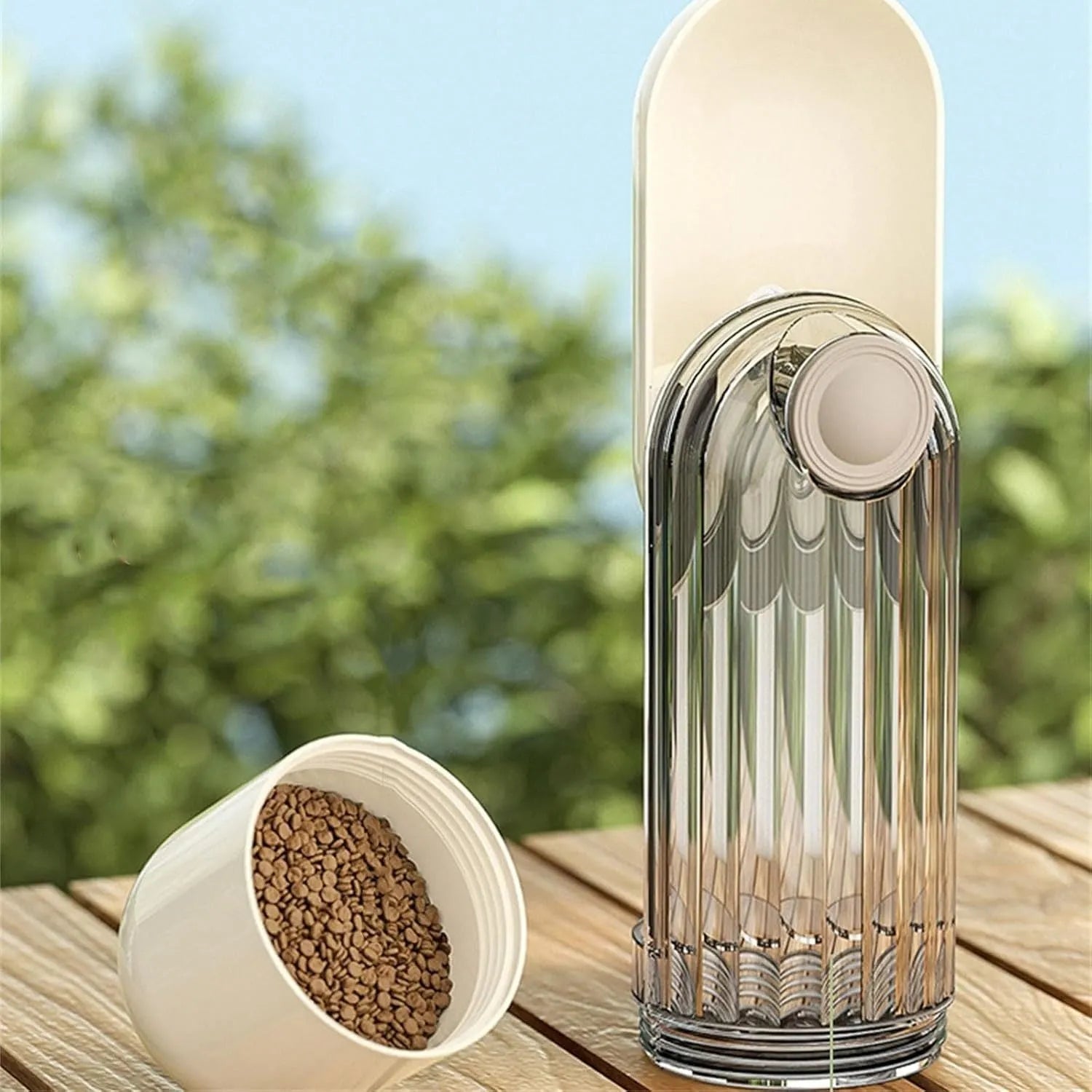 Beige and green foldable leak-proof dog water bottle with food container for outdoor use