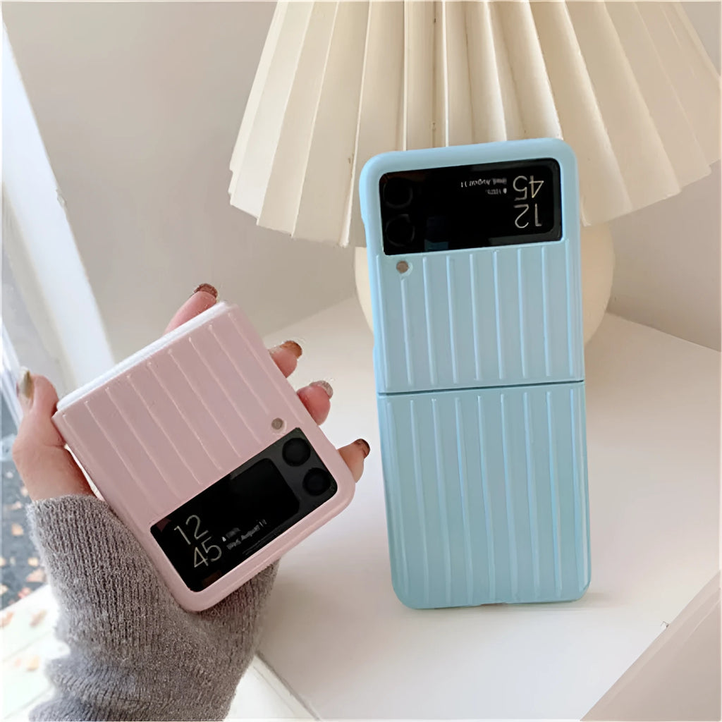 Samsung Z Flip3 folding phone in a slim, solid-colour flip case showing front and back views.