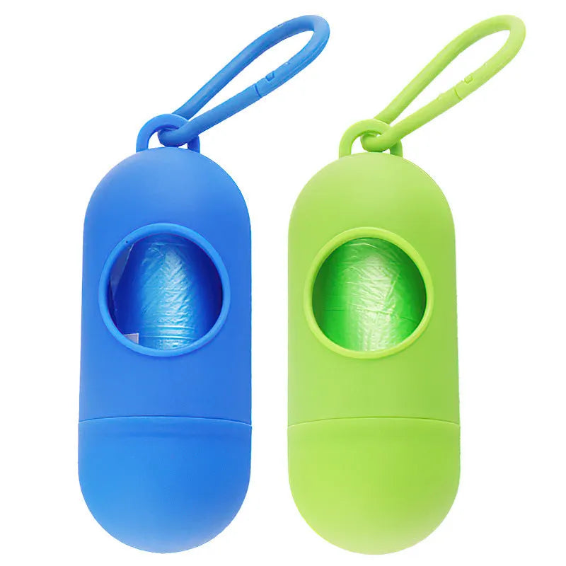 Black dog poop bag holder with side hook and Velcro closure, showing compact size.
