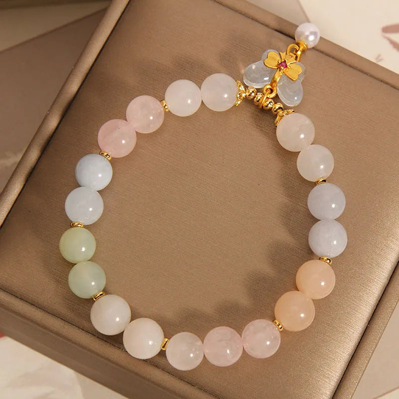 Women's morganite crystal bracelet with colourful butterfly pendant in original jewellery design