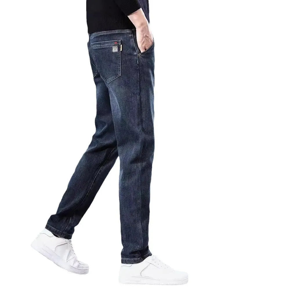 Blue grey slim straight casual trousers with a zipper fly on a mid-waist.