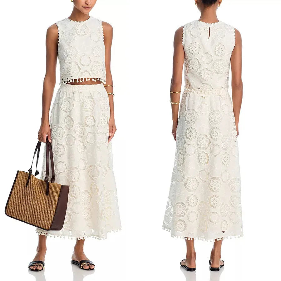 White women's sleeveless top and long skirt suit set with retro embroidery detail