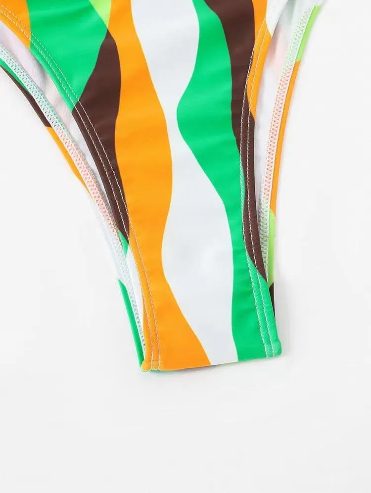 Women's printed beach bikini three-piece set with swimsuit top, briefs, and matching skirt in high-elasticity fabric