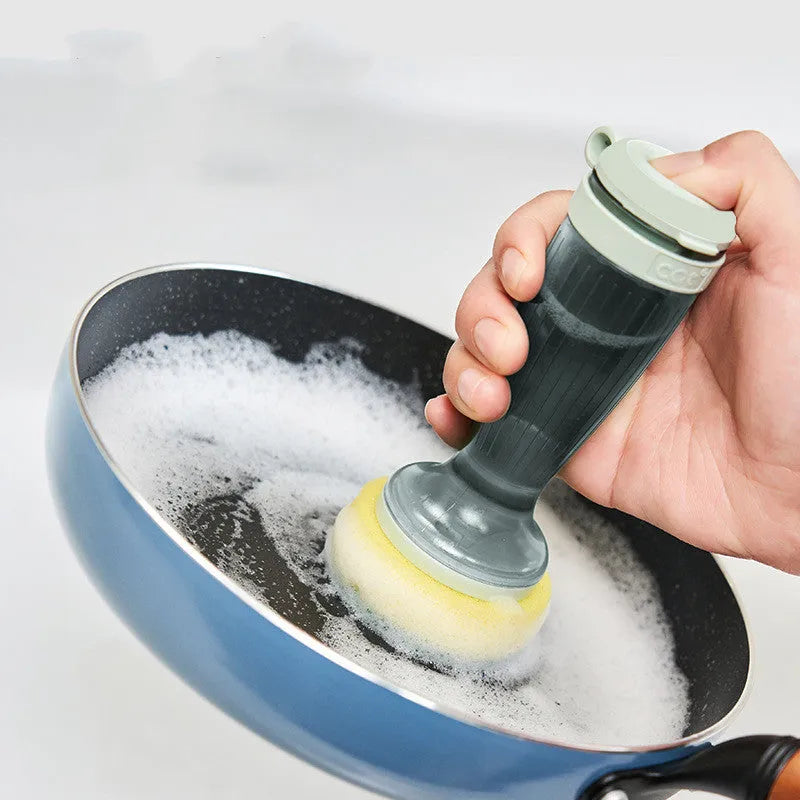 Milk white pot brush with soap dispenser in handle and non-scratch bristles for kitchen sink use.