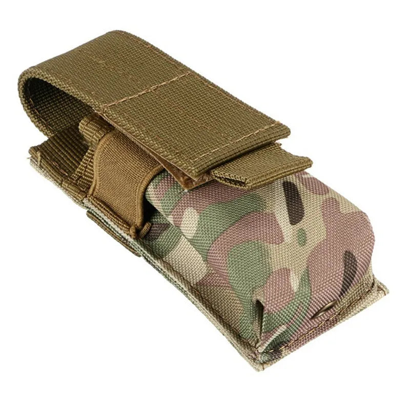 Black MOLLE-compatible tactical waist pouch with elastic cord closure, shown next to a pistol magazine.