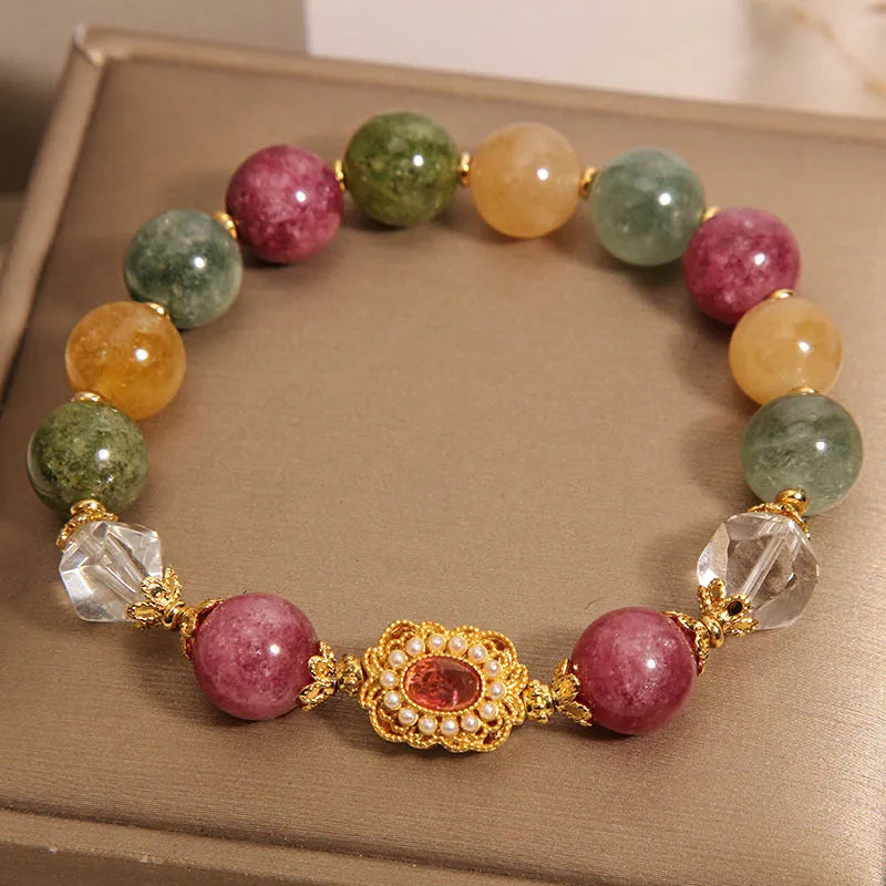 Women's alloy bracelet with colour tourmaline round beads on a pearl crystal base and rhinestone details.