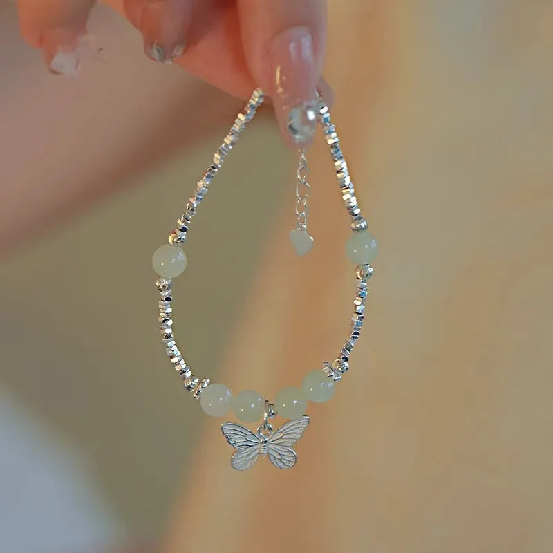 Women's Hetian jade bracelet and necklace set with silver butterfly charms on electroplated copper