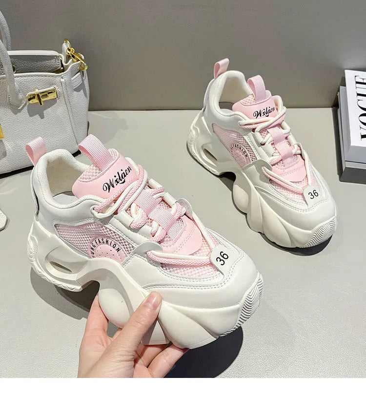 Women's beige casual sneakers with cross shoulder straps and a thick mid-heel sole