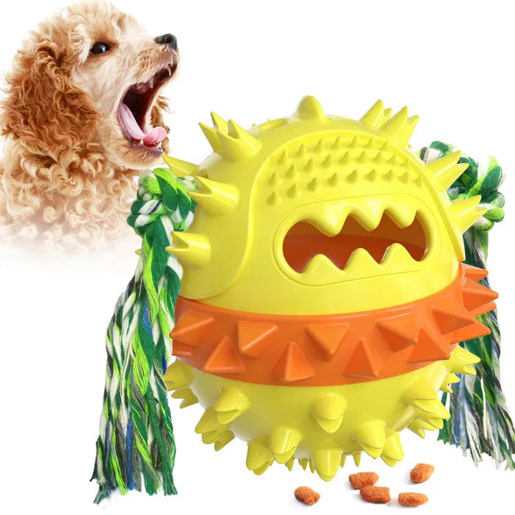 Blue and red squeaky dog chew toy with rope, treat dispenser hole, and 4.25 inch diameter ball shape.