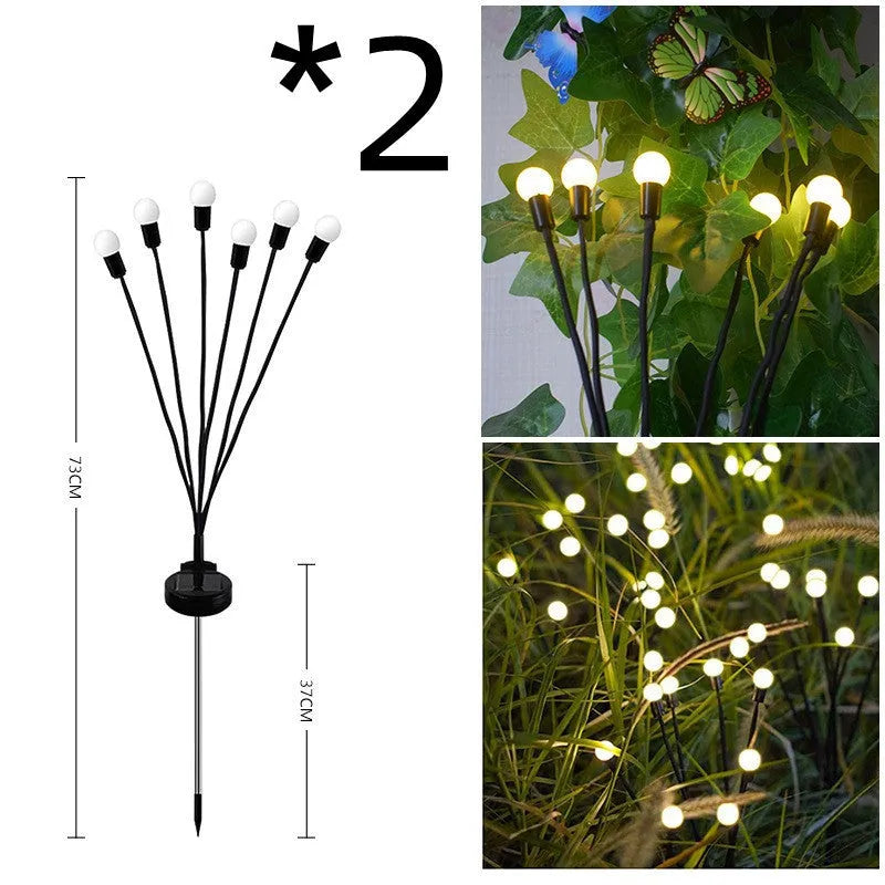 Solar-powered LED garden light with multiple heads on stainless steel ground spikes