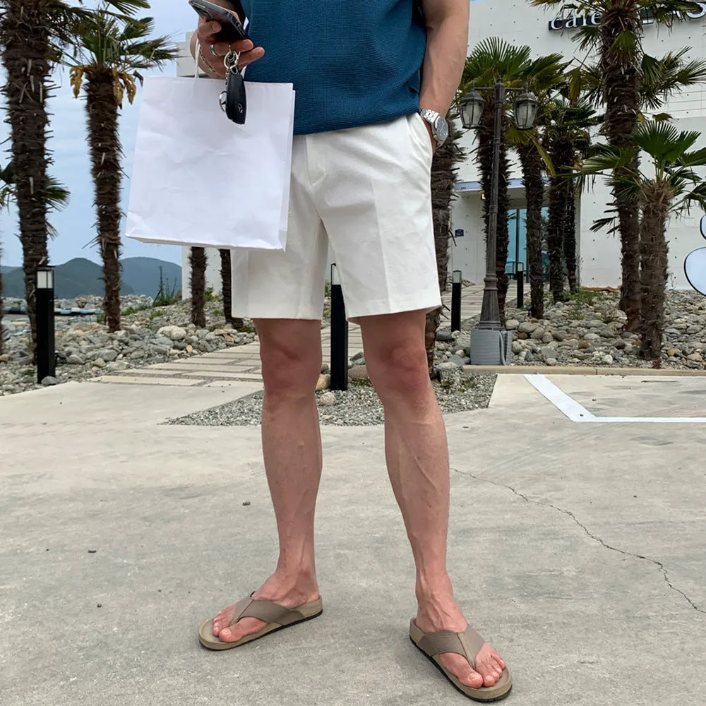 Men's straight-leg casual shorts in solid black colour, laid flat to show loose fit.
