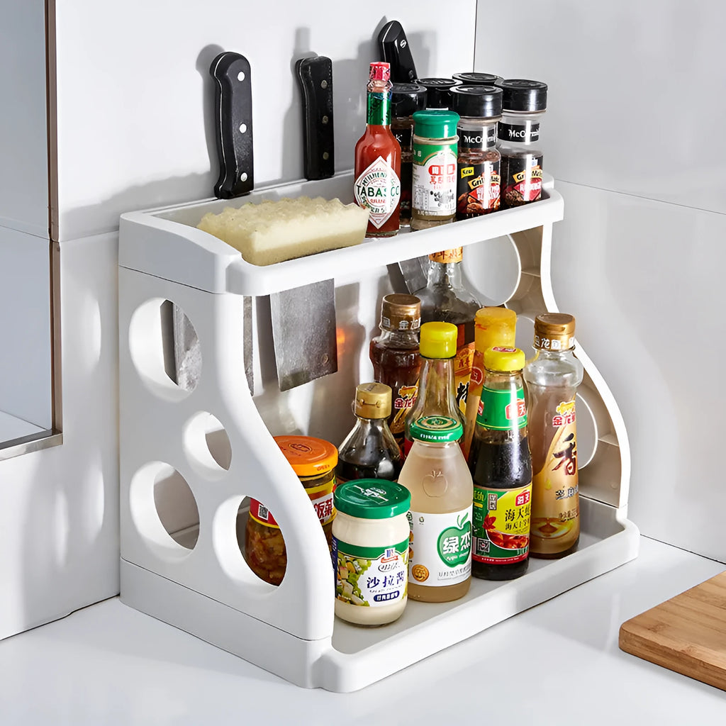 Foldable kitchen storage rack with multilayer shelves in white colour on countertop