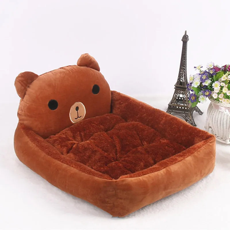 A cartoon-style soft plush sofa bed for a small dog or cat, shown in a grey colour.