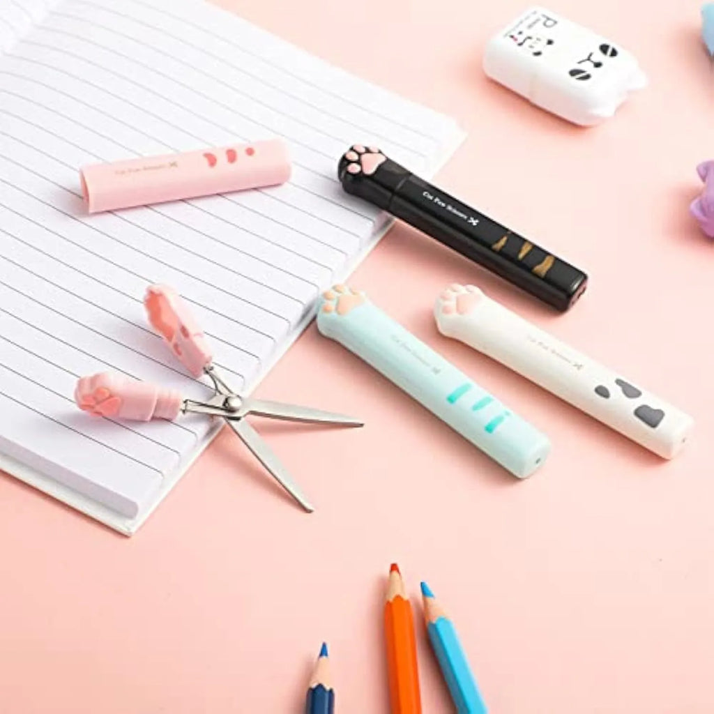 Cat paw mini folding scissors in pink, white, black and blue colours showing compact 8.7 cm size