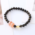 Natural obsidian Pi Xiu bracelet with animal zodiac modelling in retro artistic style.