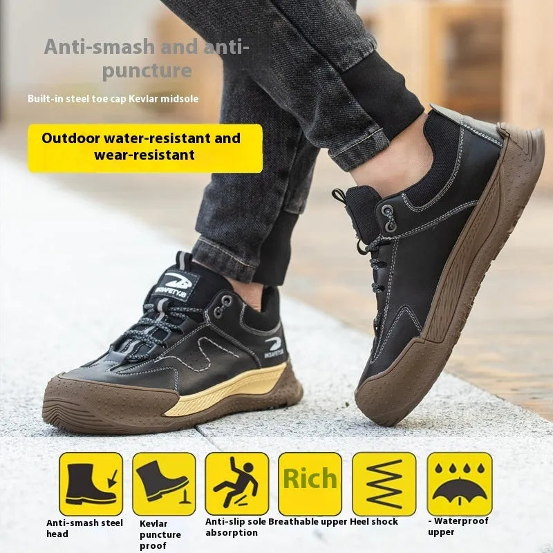 Flyknit leather work safety shoe with rubber sole in black, shown on a grey background