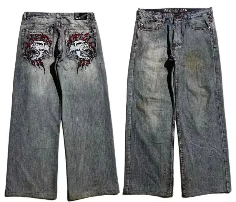 Men's washed grey wide-leg straight jeans on a neutral background.