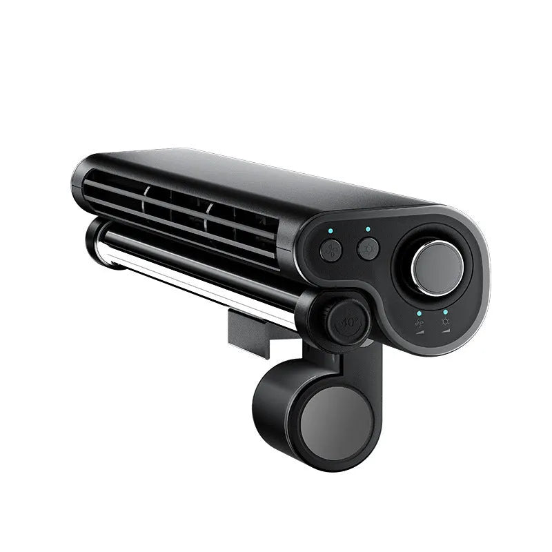 Black bladeless USB fan with clip attached to a laptop screen, showing integrated LED light.