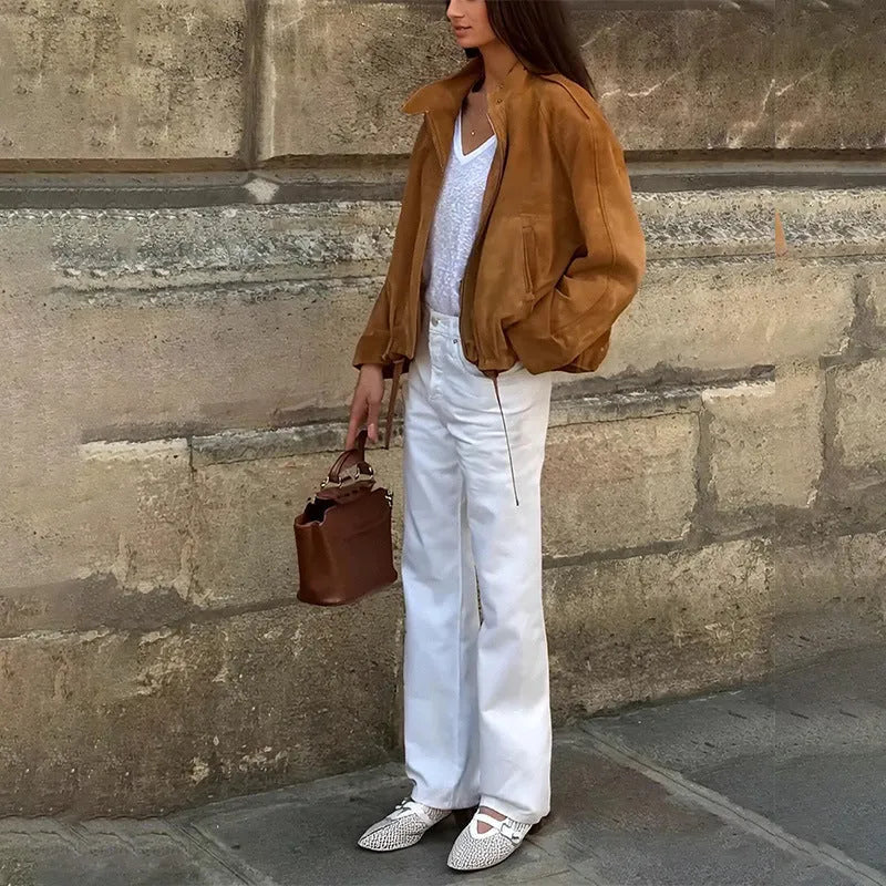 A loose-fitting solid colour long sleeve jacket on a white background.