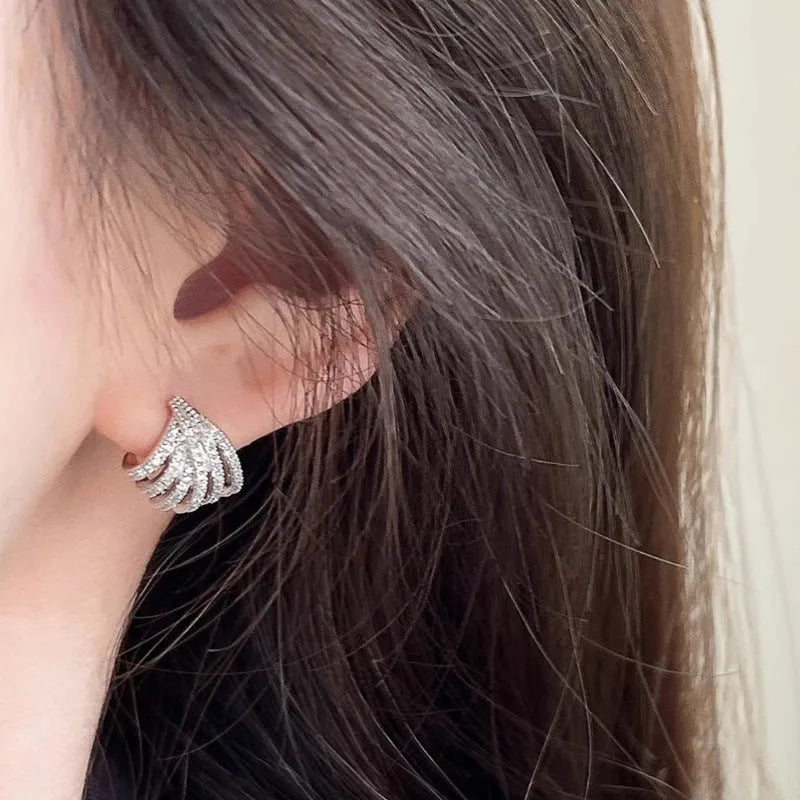 Geometric line design earrings with zircon stones in platinum colour electroplated finish