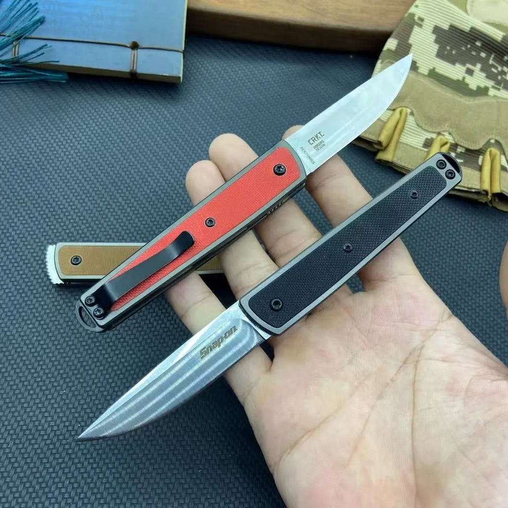 Folding fruit knife with stainless steel blade in black, brown, or red with measurements showing 17cm length
