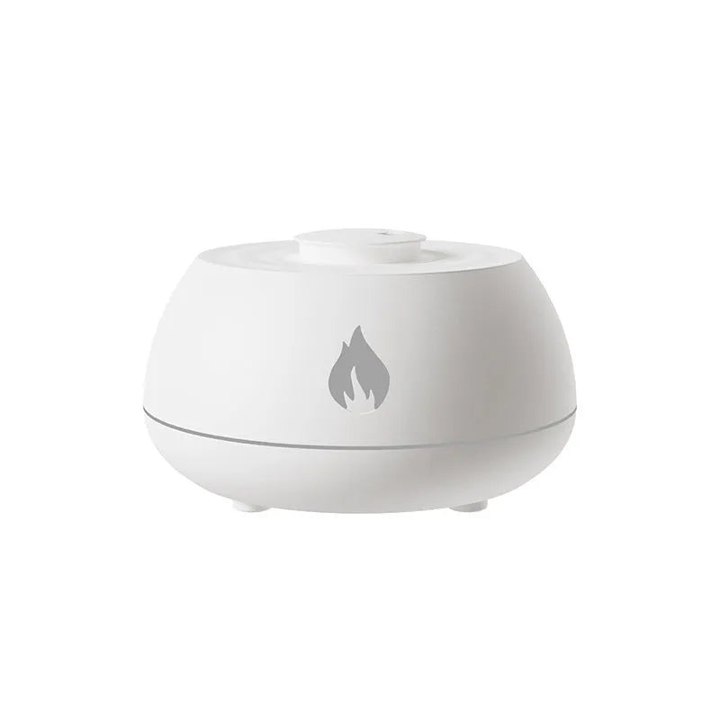 Black flame humidifier aroma diffuser with 130ml tank, 7 colour lights, and USB power on a wooden table