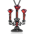 Close-up of a women's retro gothic necklace with a hollow candlestick pendant on a cross chain.