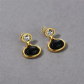 18k gold-plated brass earrings with black onyx and diamond accents, geometric shape, 28mm by 18.5mm, gold colour