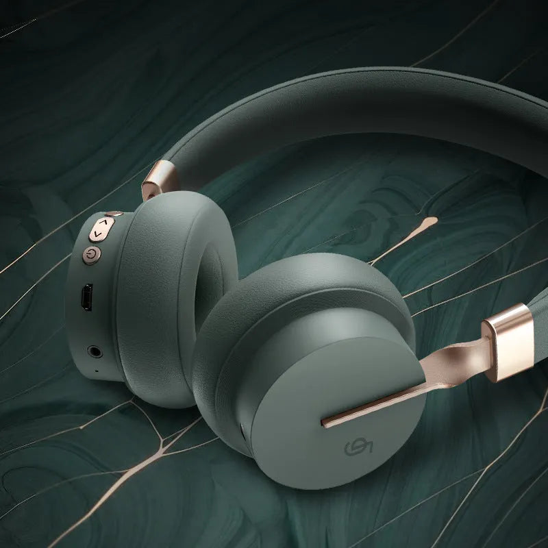 Head-mounted Bluetooth headset shown in solid green, black, red, blue, and white colour options.