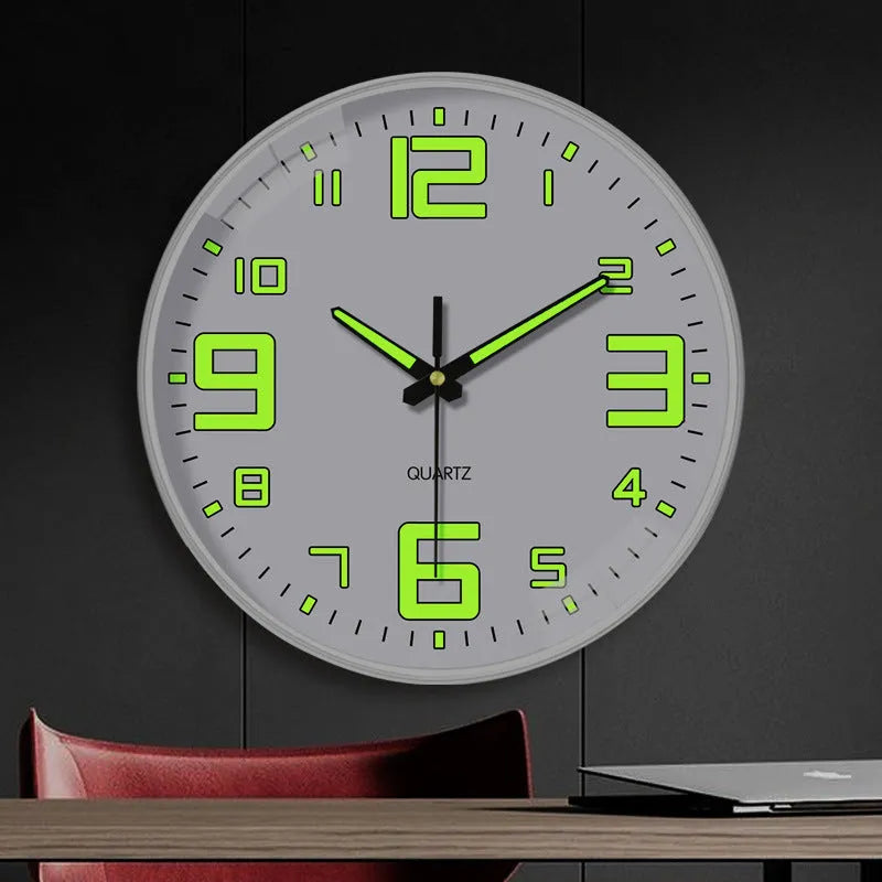 Modern luminous wall clock with plastic shell, 20cm diameter, shown in a room setting.