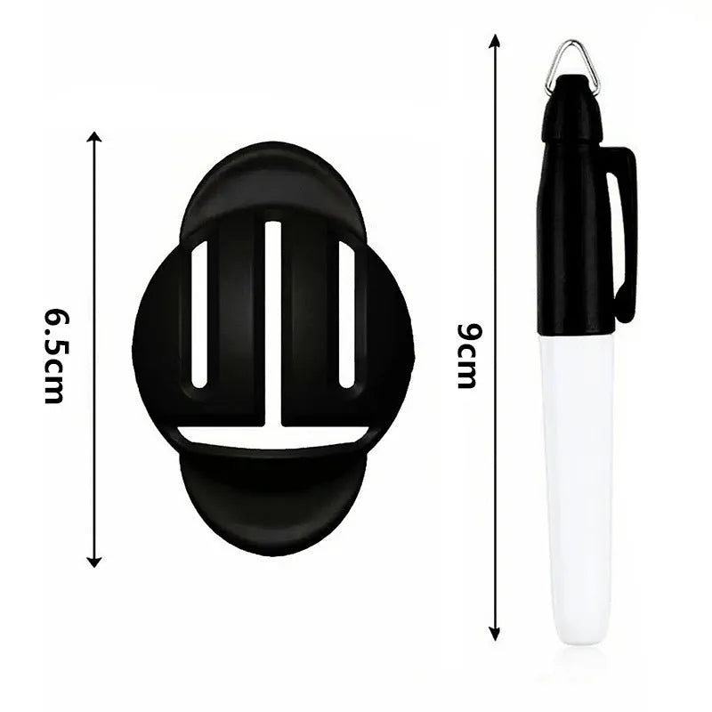 Golf scriber putter alignment tool set with plastic scribers and drawing pens on a practice green.