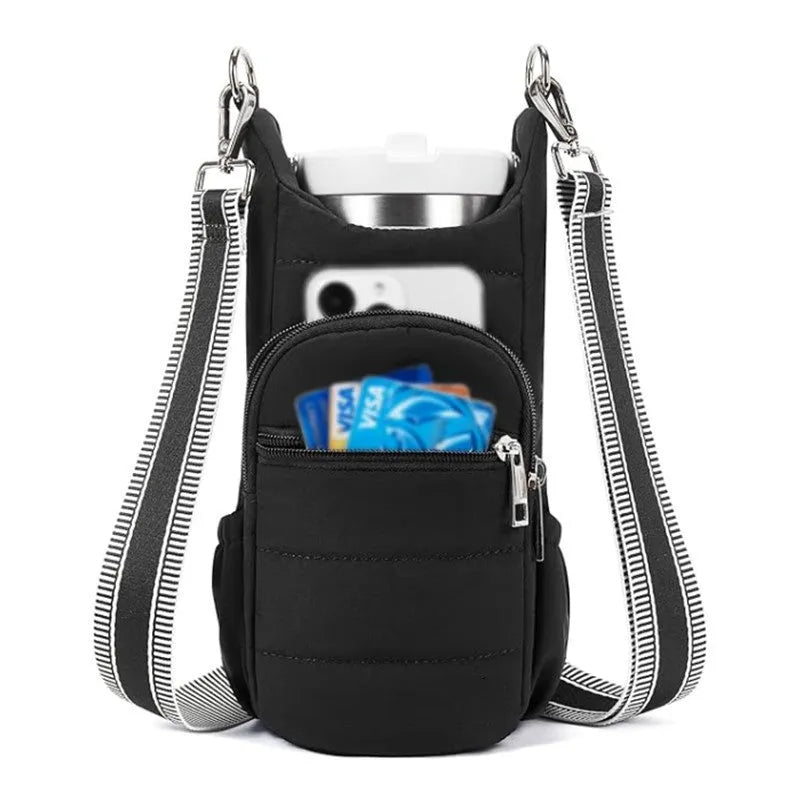 Cloth bicycle water bottle bag in beige, black, or pink colour on a bike frame.