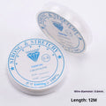 Reel of transparent white elastic fishing line thread for DIY crafting on a white background.