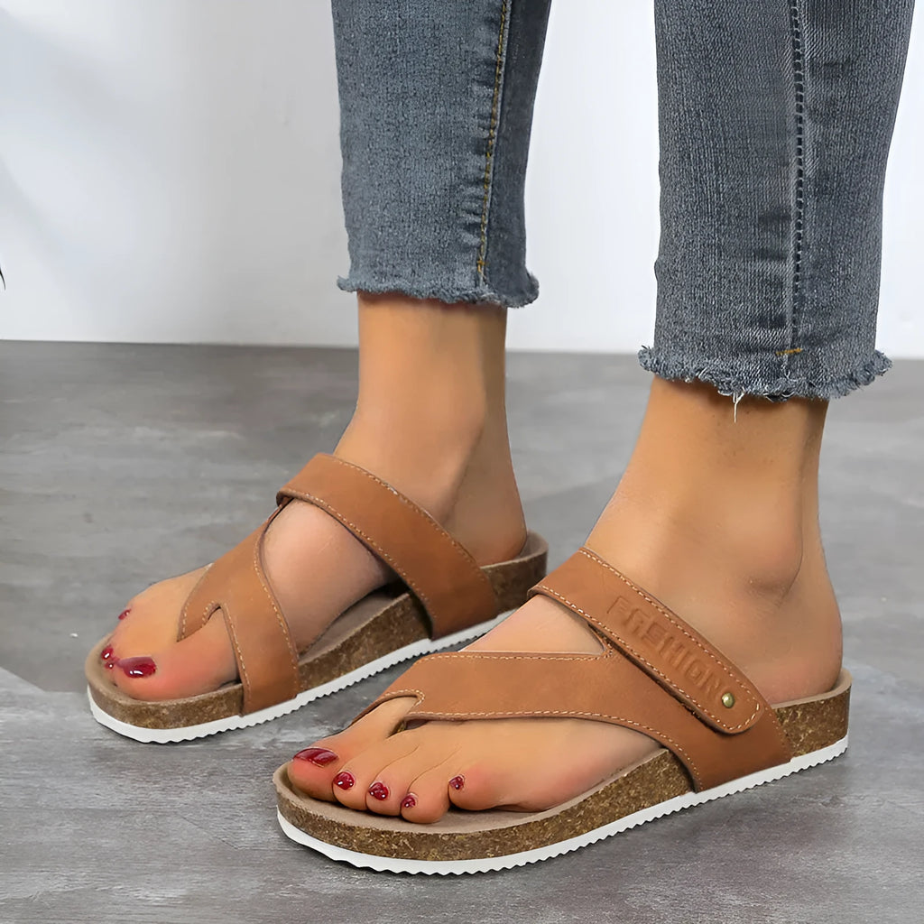 Blue flat toe ring thick-soled flip-flops on a white background.