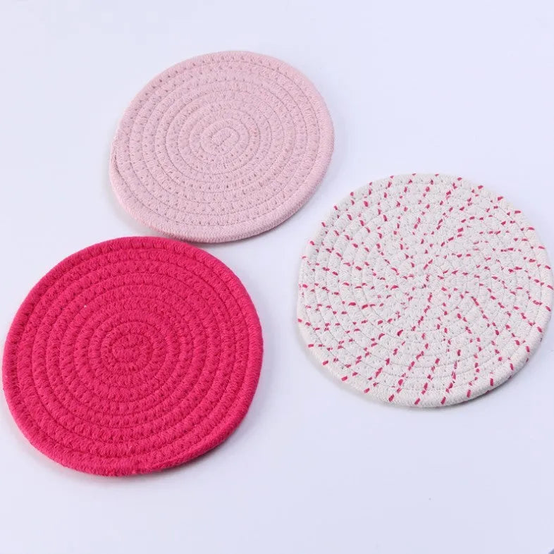 Three round 18cm cotton cord coaster placemats in modern minimalist design