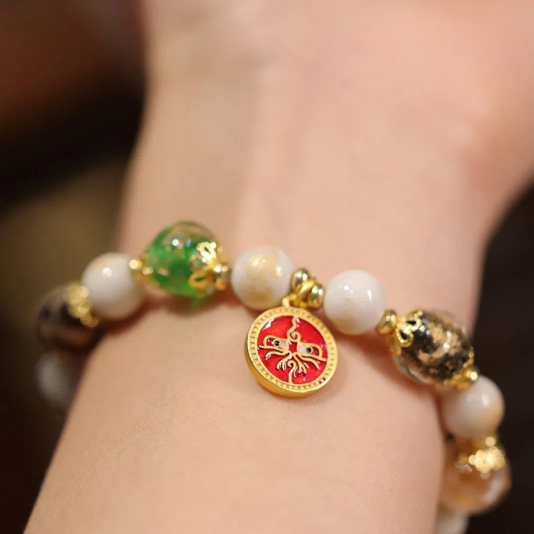 Handmade glazed bracelet with Five Gods of Wealth charm and 10mm geometric beads.