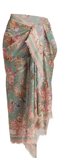 Women's creamy-white floral pattern bikini suit with matching skirt
