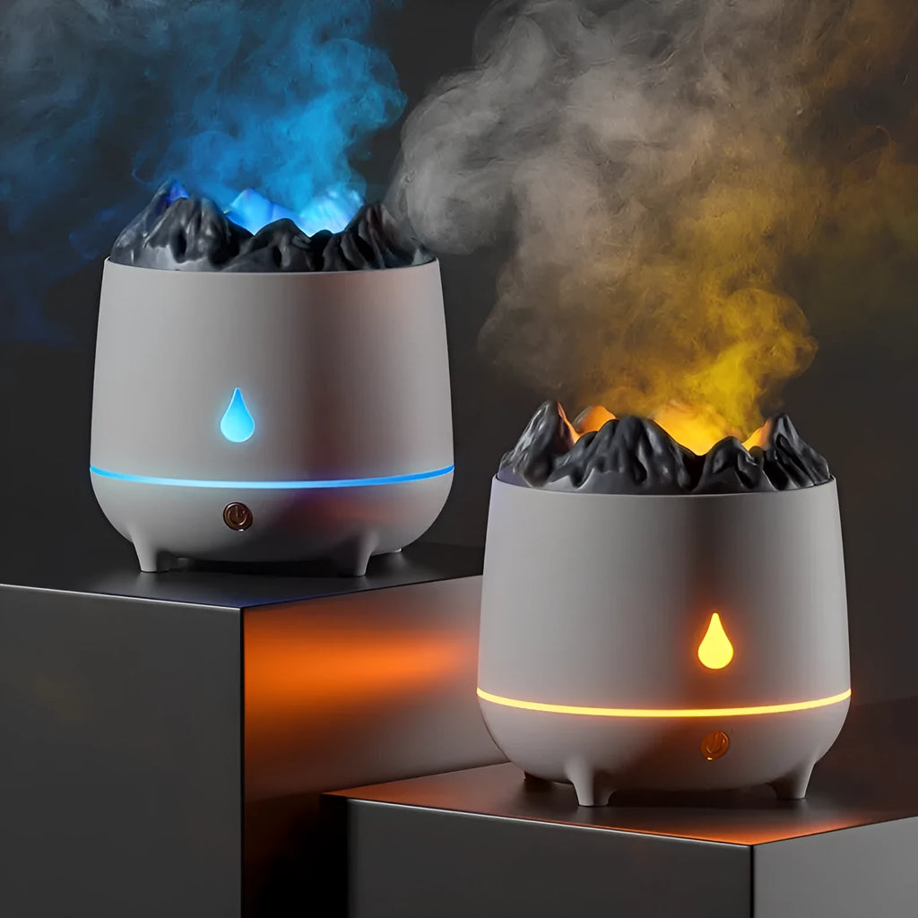 White volcano-shaped humidifier and aromatherapy diffuser on a table with USB cable.