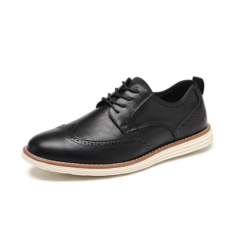 Men's black slip-on casual shoe with PU leather upper and round toe on a grey background.