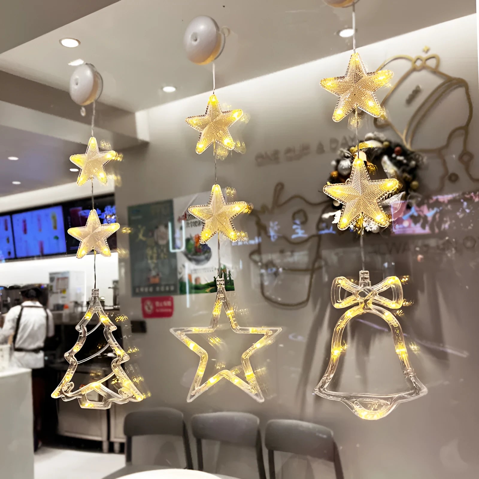 Christmas window lights with star-shaped LED pendants and suction cups for battery-operated festive decoration