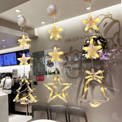 Christmas window lights with star-shaped LED pendants and suction cups for battery-operated festive decoration
