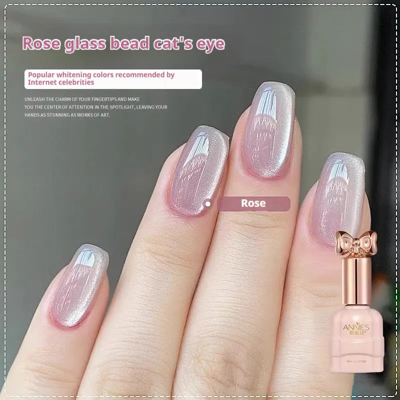 Micro glass bead cat's eye gel nail polish bottle showing cat's eye visual effect