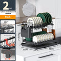 White and black double-layer kitchen storage rack with a removable draining tray.